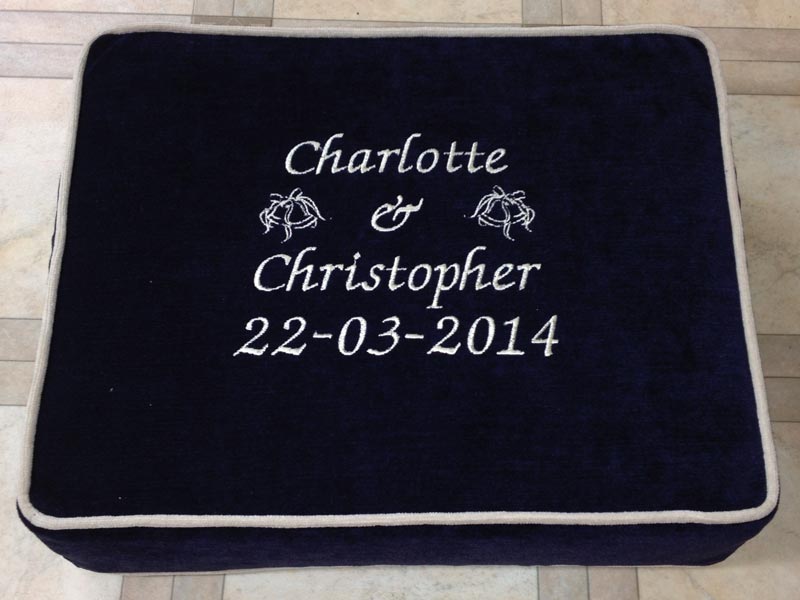 A church kneeler with bespoke embroidered text